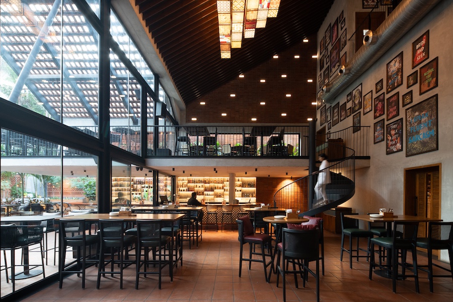 forefathers restaurant and bar Hyderabad jubilee hills indoor outdoor dining venue handmade brick terracotta tile sloped roof mezzanine spiral staircase