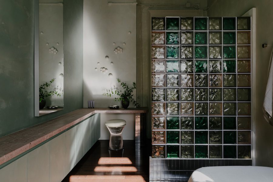 blue nomad skincare studio new york blue green muted glass partition