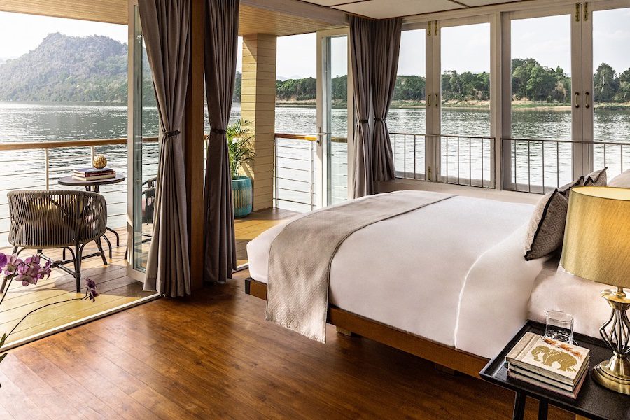 mekong kingdoms boheme luxury river cruise loatian motifs wood bedroom guestroom