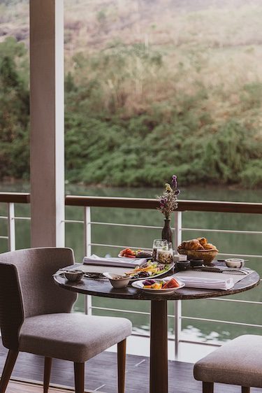 mekong kingdoms boheme luxury river cruise dining bistro table