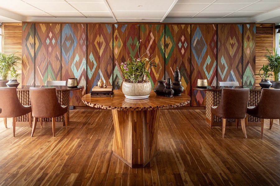 mekong kingdoms boheme luxury river cruise lobby loatian motifs wood
