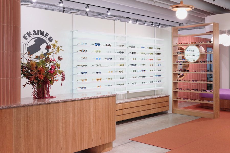 framed ewe eyewear glasses store phoenix flagship interior wood pink
