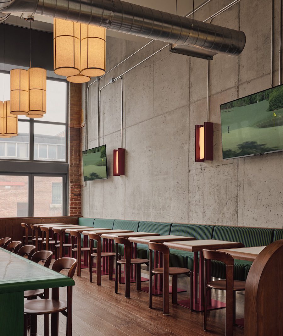 muni indoor immersive golf simulator industrial nordelec building adaptive reuse mint green restaurant bar