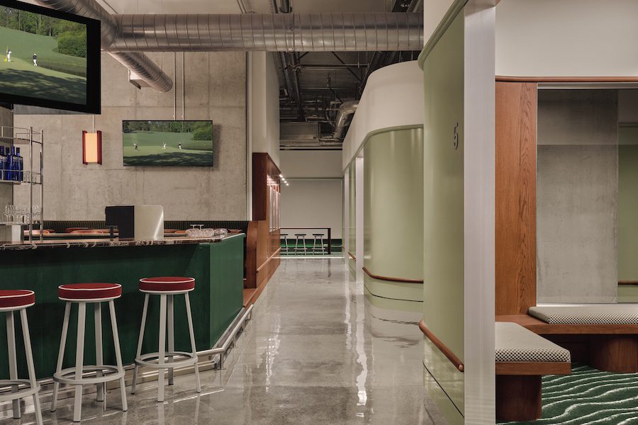 muni indoor immersive golf simulator industrial nordelec building adaptive reuse mint green bar