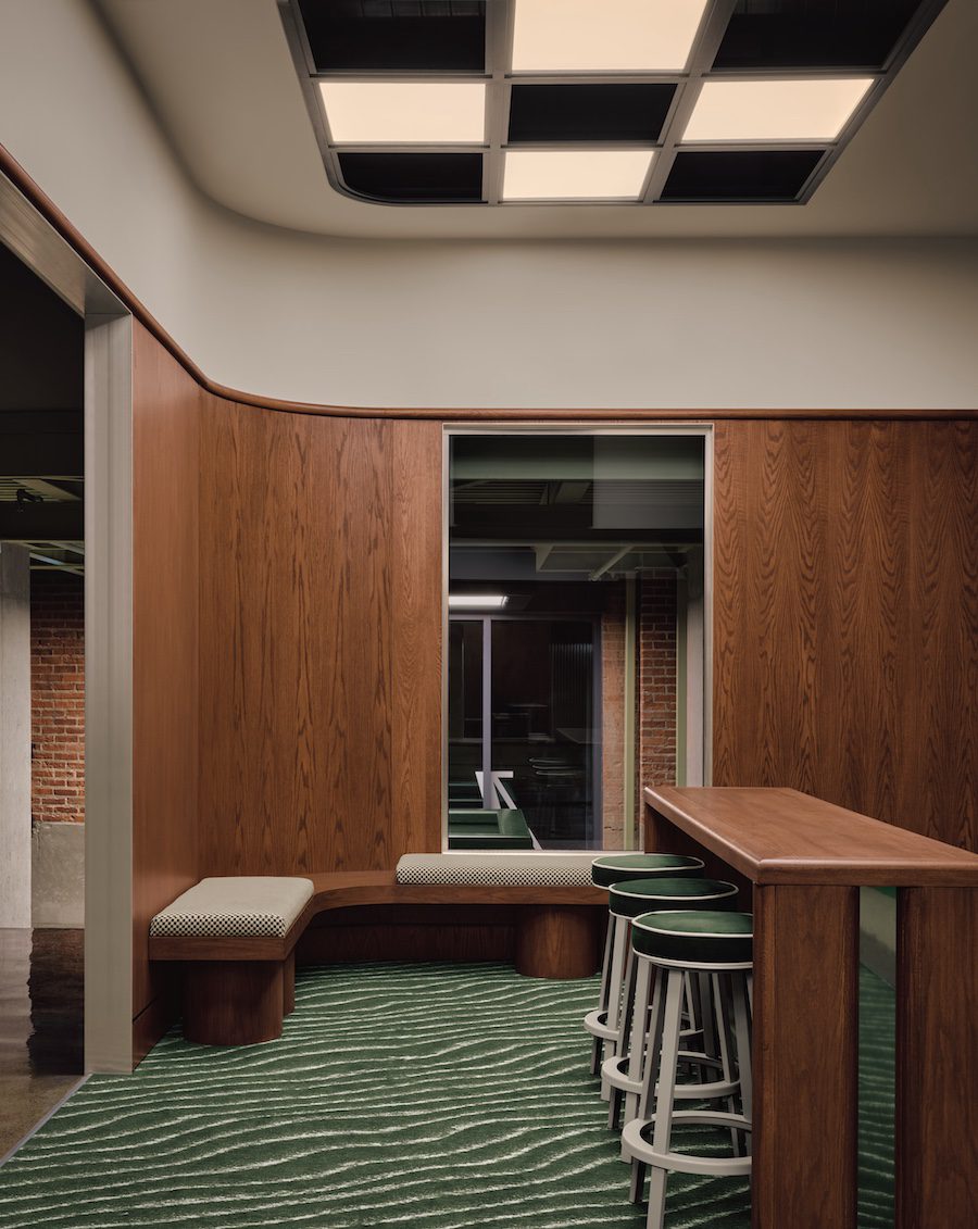 muni indoor immersive golf simulator industrial nordelec building adaptive reuse checkered light