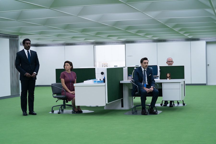 Britt Lower, Zach Cherry, Tramell Tillman and Adam Scott in Severance Apple TV+ green walls retro futurism midcentury modern brutalist cubicles fluorescent light green carpet