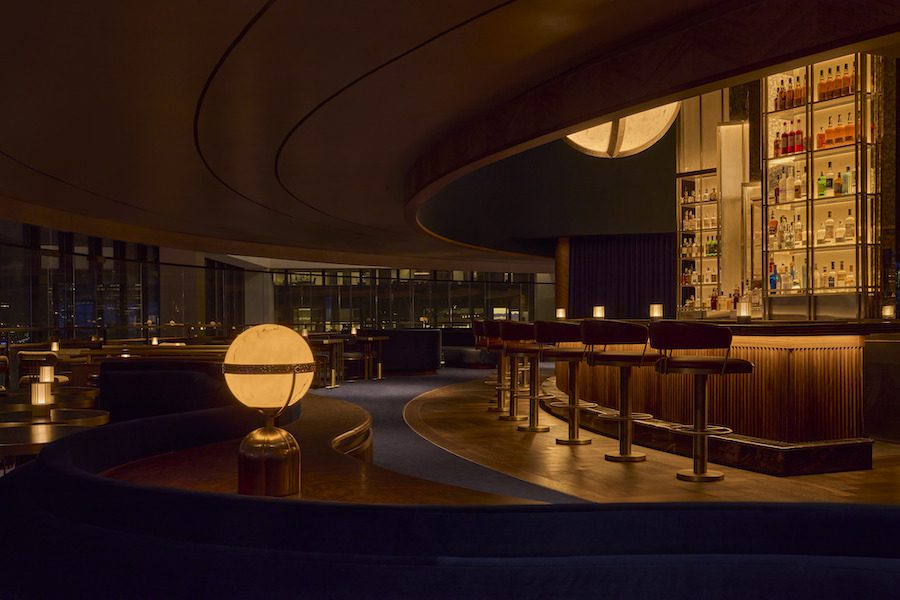 the view rotating spinning restaurant new york marriott marquis theater district union square hospitality group red flooring mirrors round curved walls bar
